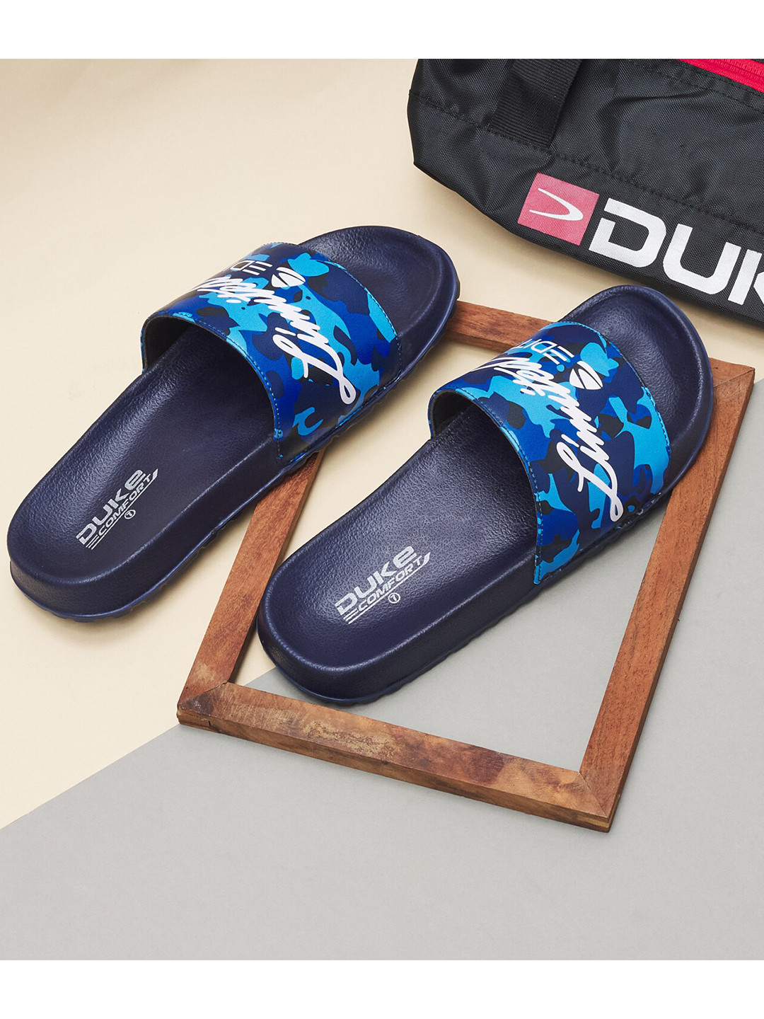 

Duke Men Blue & Black Printed Sliders