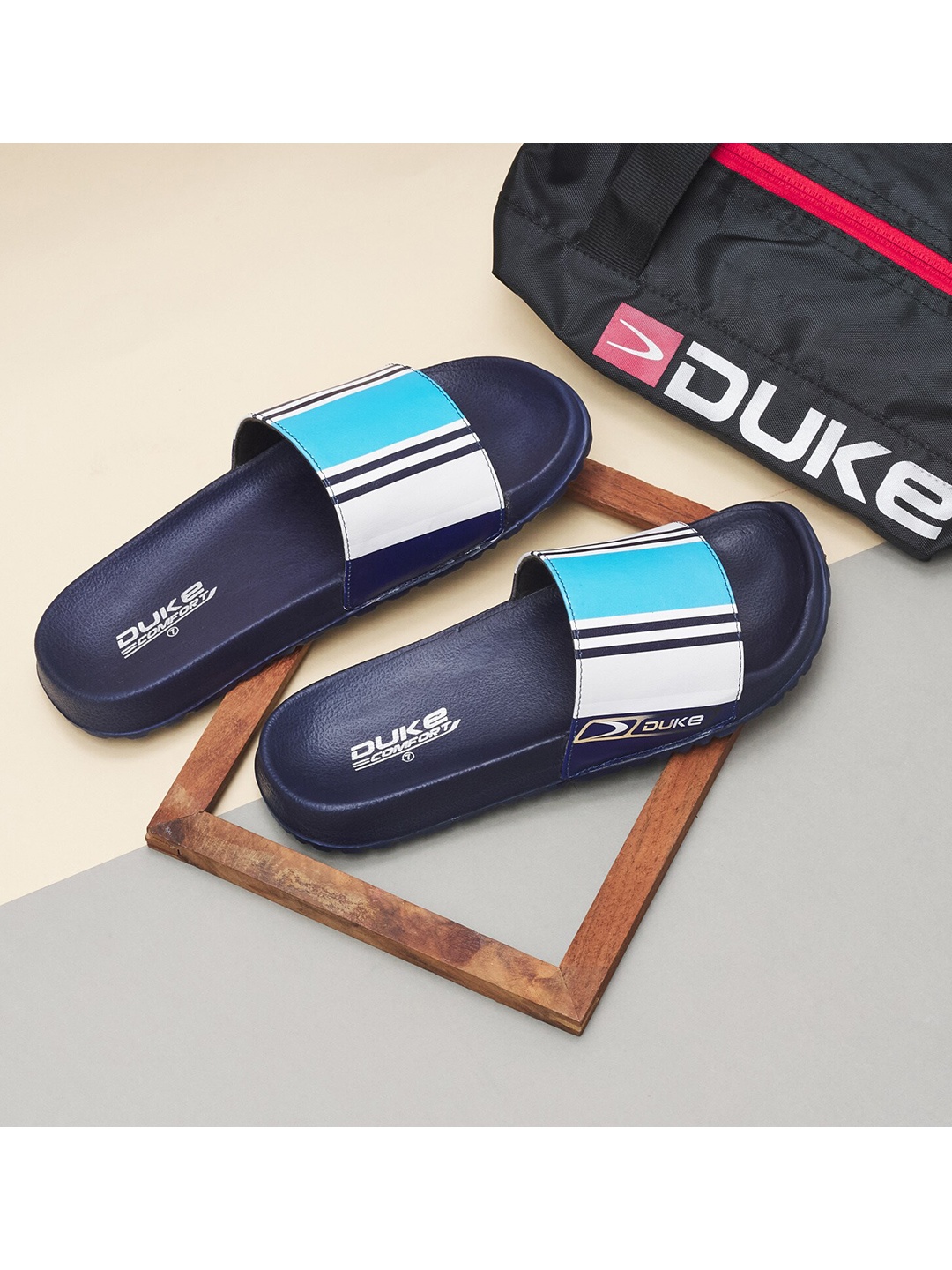 

Duke Men Blue & White Striped Sliders