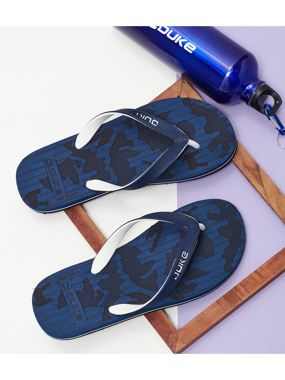 

Duke Men Navy Blue & White Printed Thong Flip-Flops