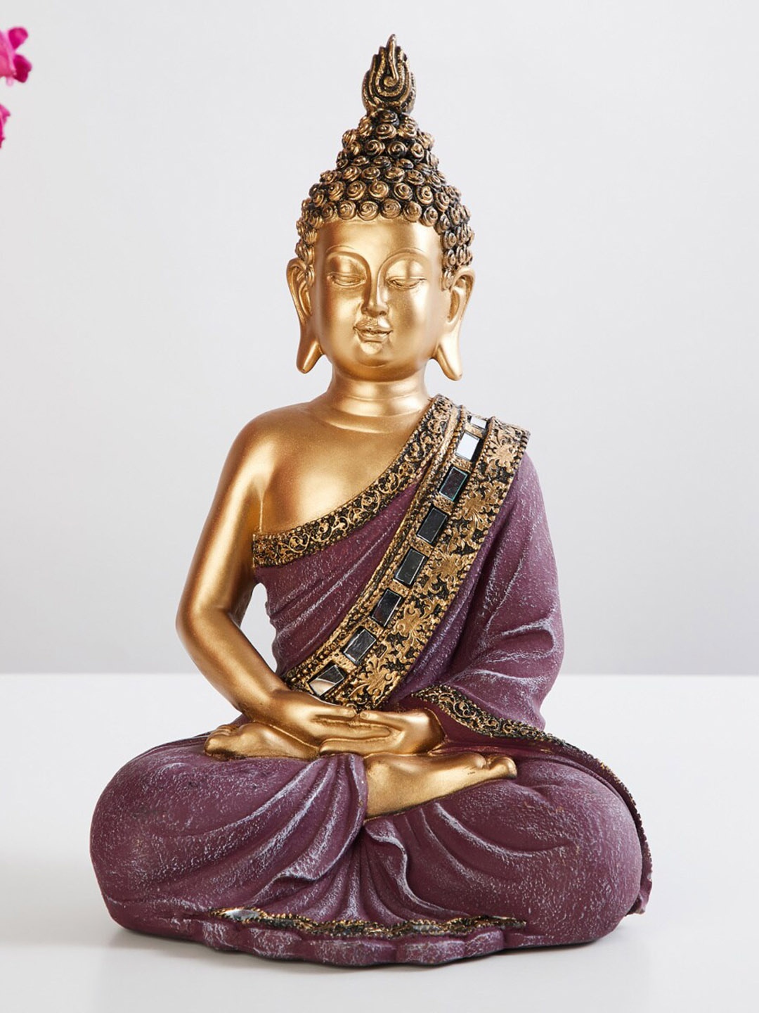 

Home Centre Purple & Gold-Toned Textured Buddha Figurine Showpieces