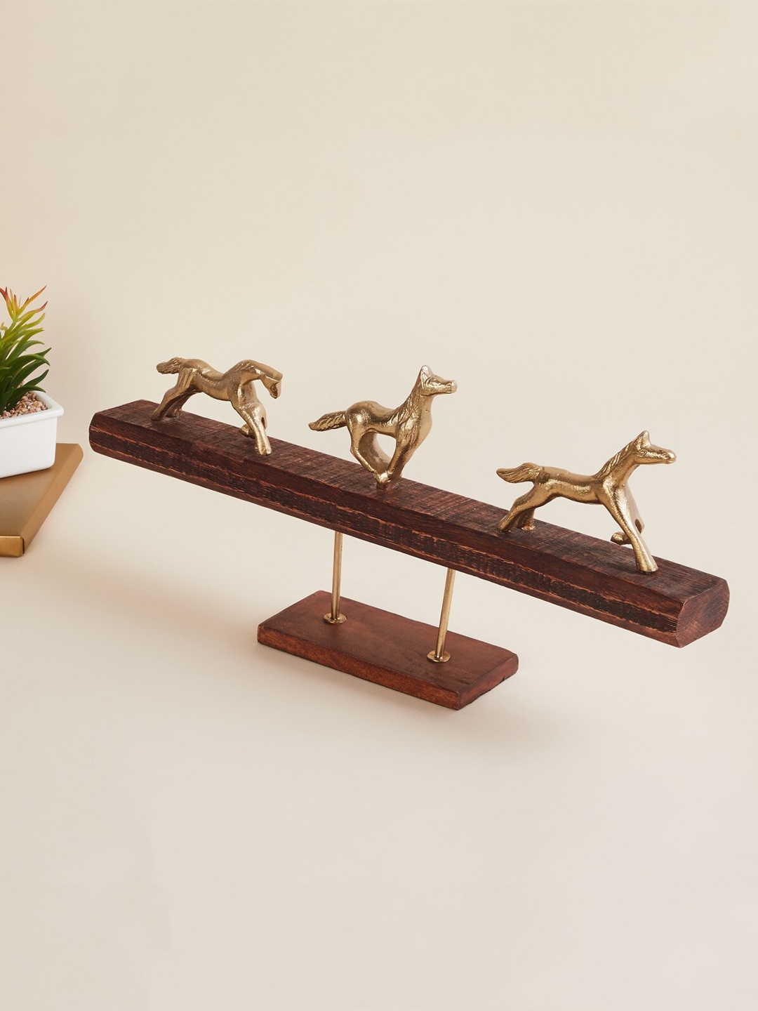 

Home Centre Gold-Toned & Brown Solid Running Horses On Base Figurine Showpieces