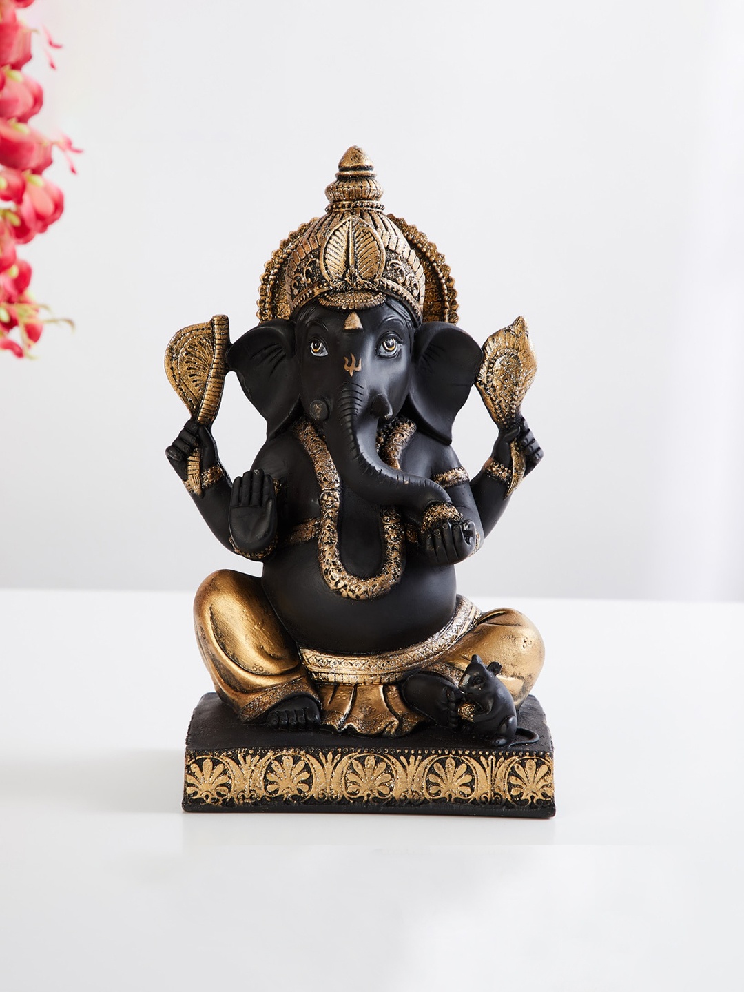 

Home Centre Black & Copper-Toned Textured Polyresin Ganpati Figurine Showpiece