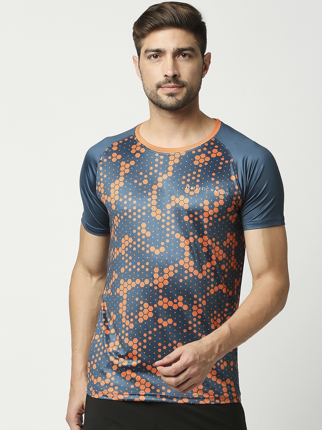 

AESTHETIC NATION Men Navy Blue & Orange Printed Dri-FIT T-shirt
