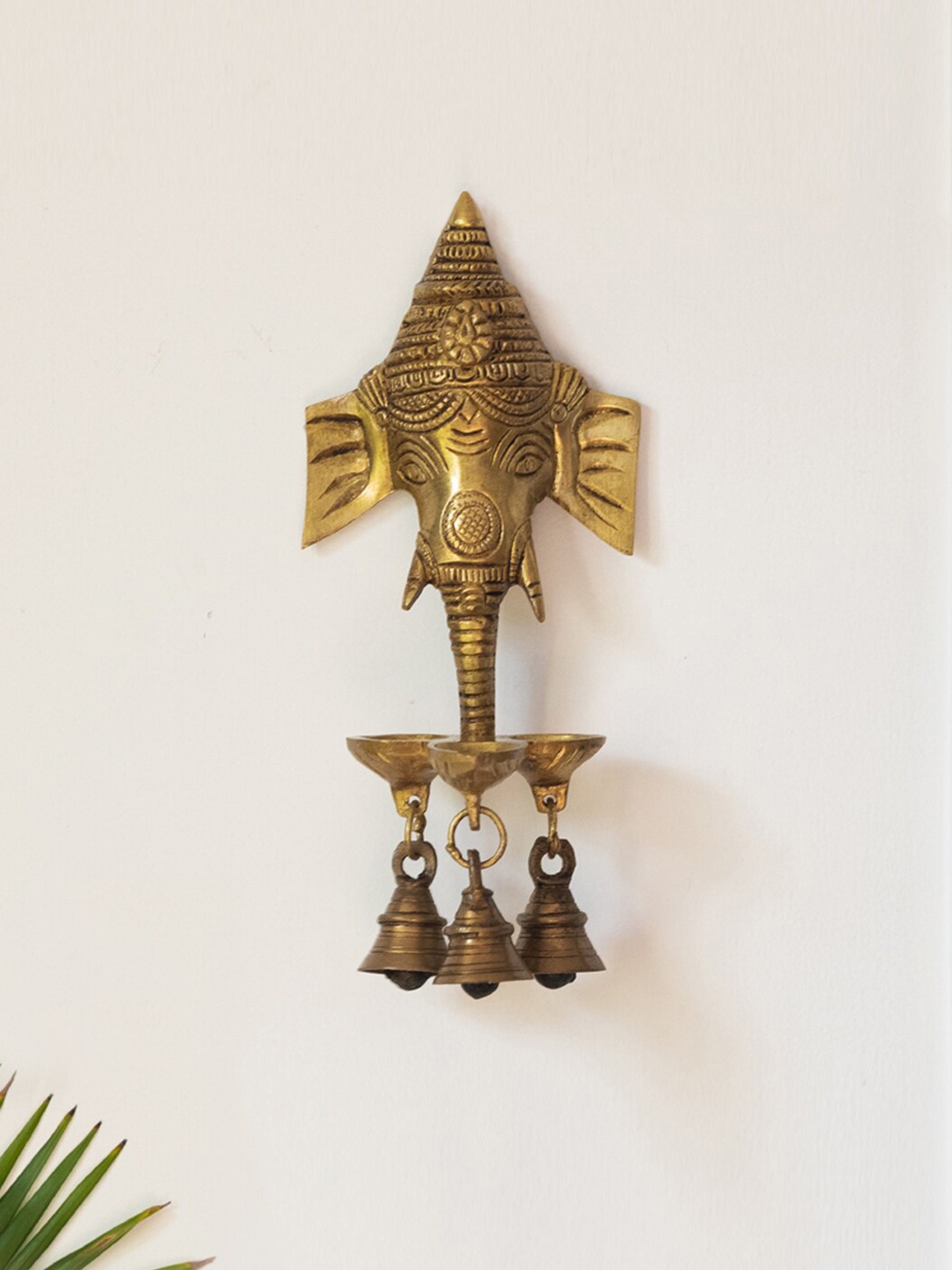 

ExclusiveLane Gleaming Ganesha Hand-Etched Decorative Brass Wall Hanging Diyas With Bells, Gold