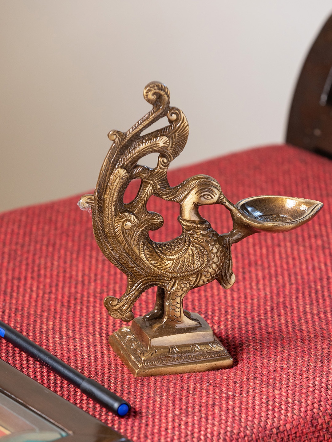 

ExclusiveLane Gol-Toned Brass Princely Peacock Hand-Etched Carved Diya, Gold