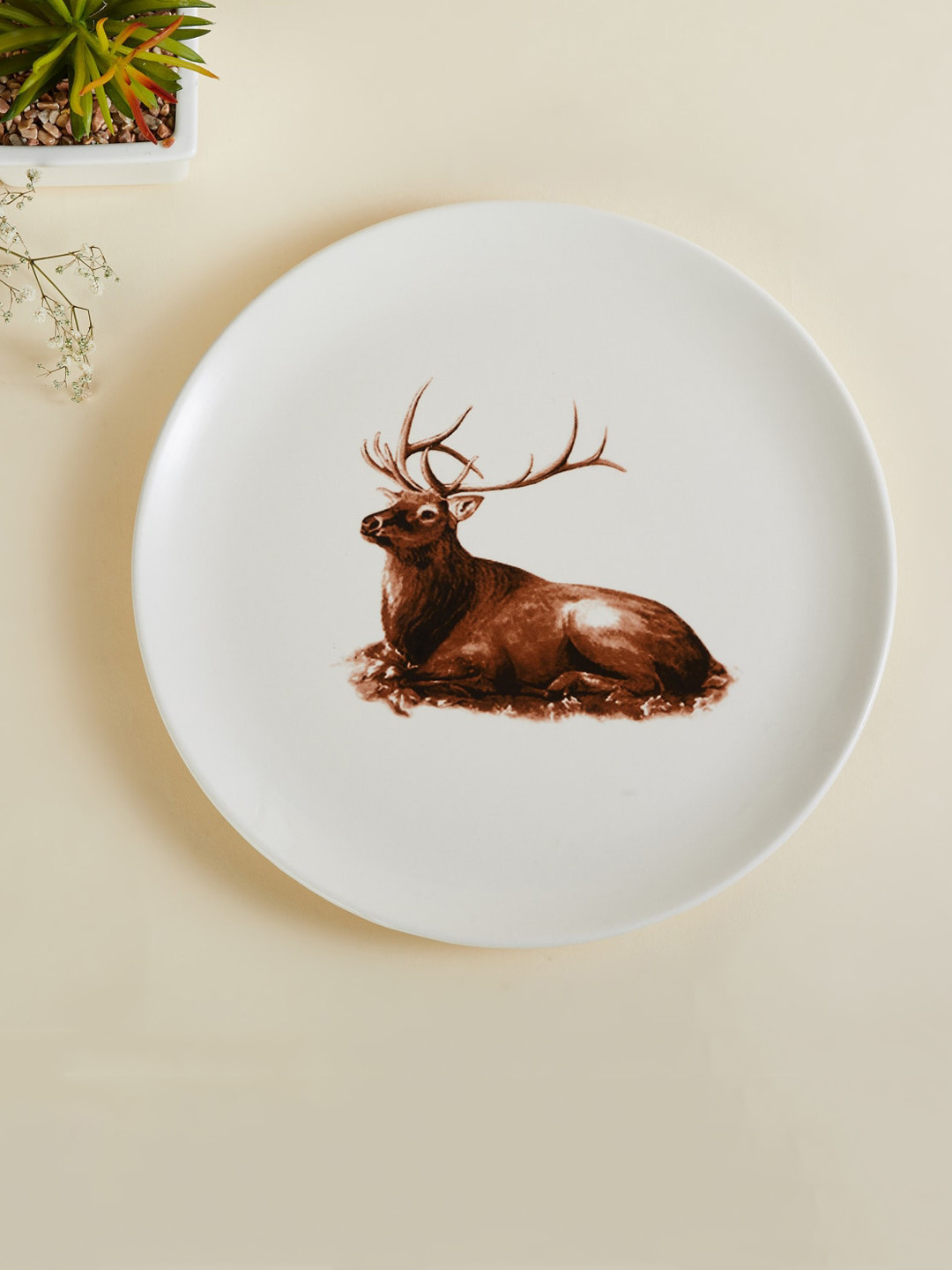 

Home Centre White Reindeer Printed Ceramic Decorative Wall Plate Decor