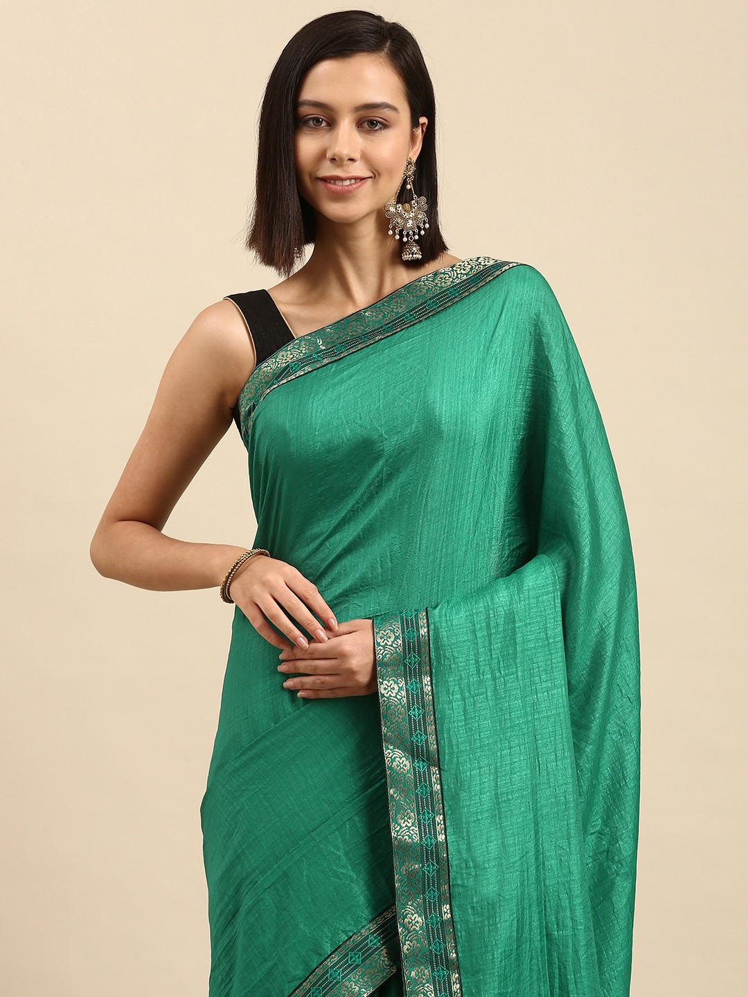 

Anouk Turquoise Blue Solid Saree with Woven Design Border