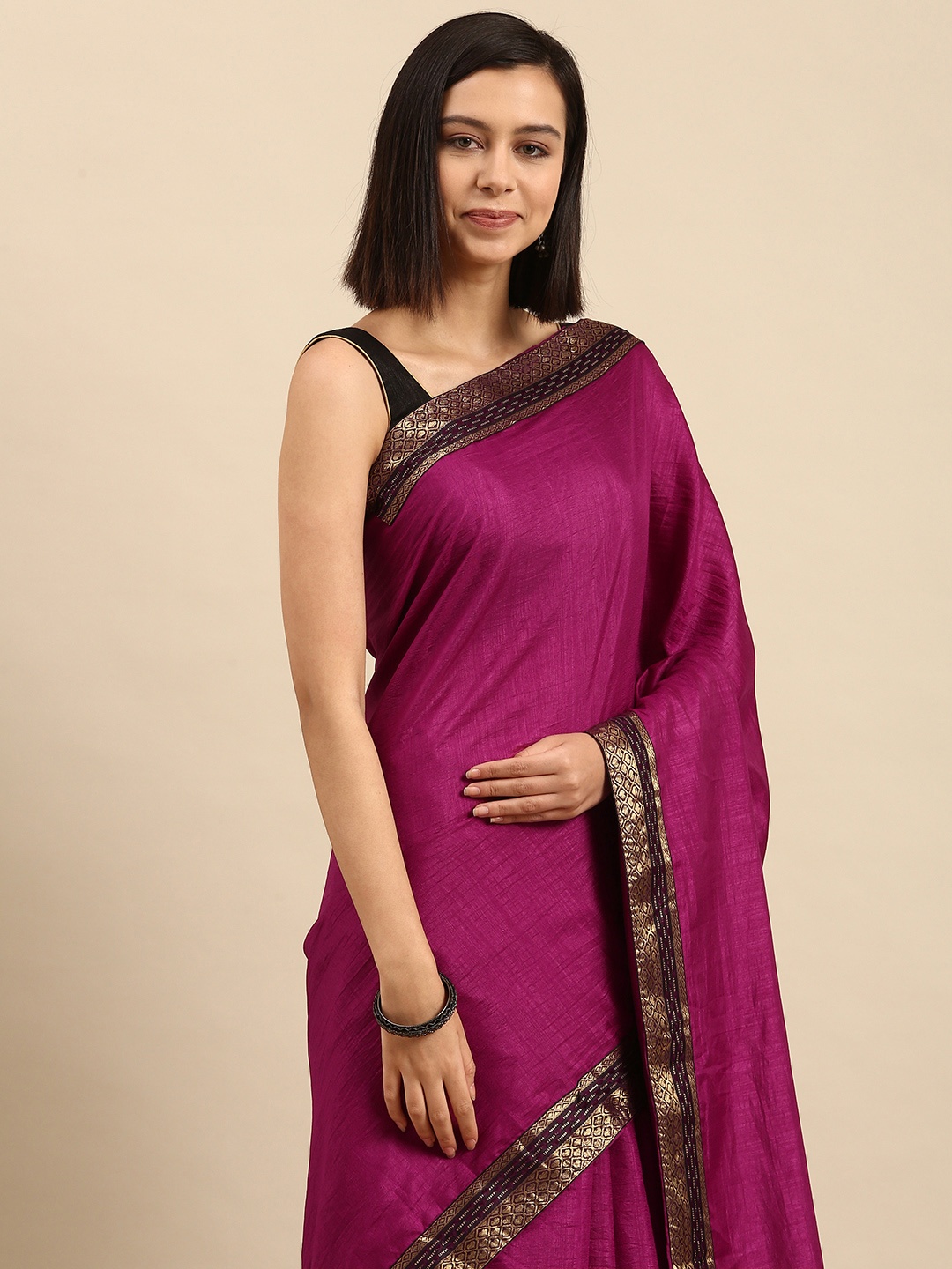 

Anouk Magenta Solid Saree with Woven Design Border