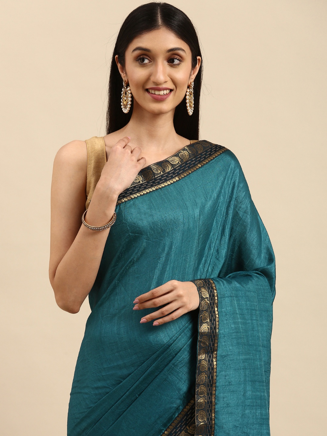 

Anouk Teal Blue Saree with Woven Design Border