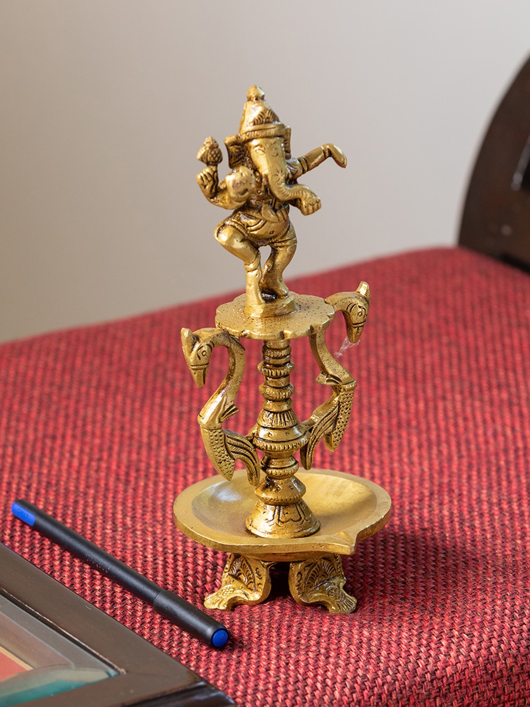 

ExclusiveLane Gold-Toned Gallant Brass Ganesha Idol Showpiece