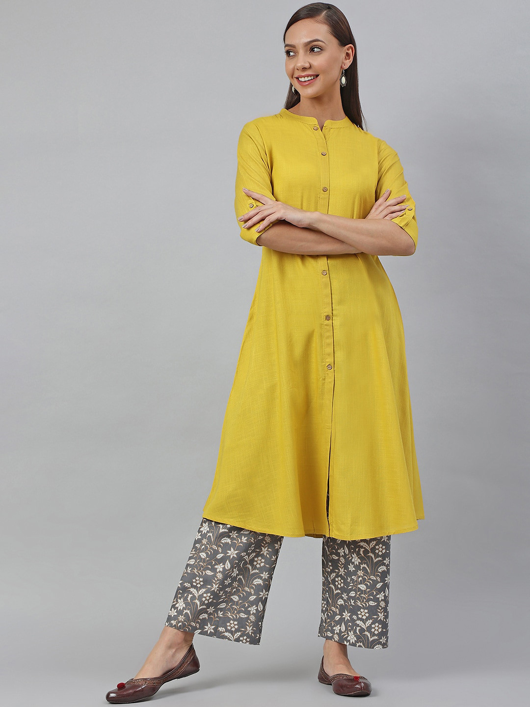 

Janasya Women Yellow Rayon Slub Solid Shirt Style Kurta