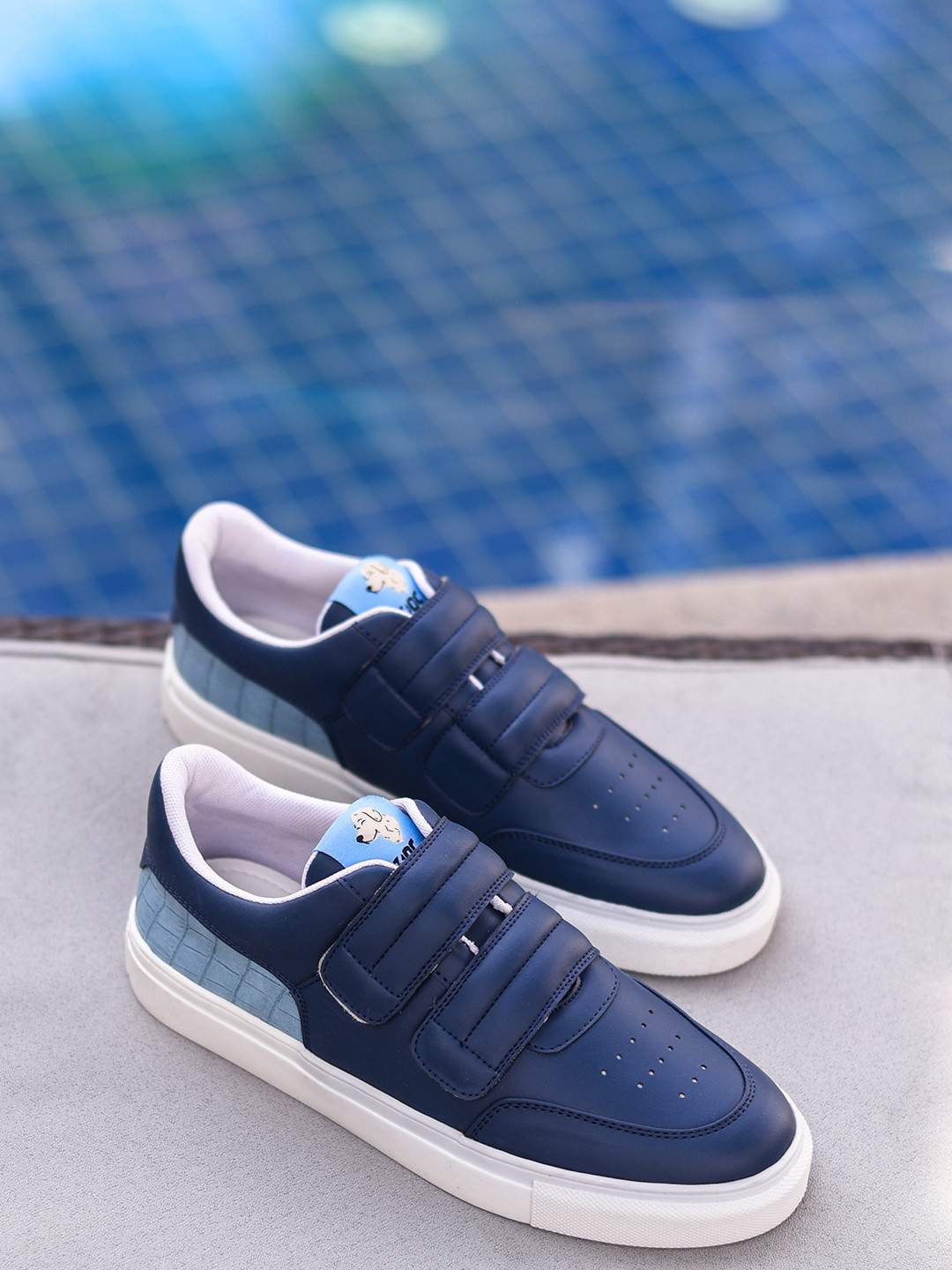

Doc Martin Men Navy Blue Colourblocked Antibacterial Slip-On Sneakers