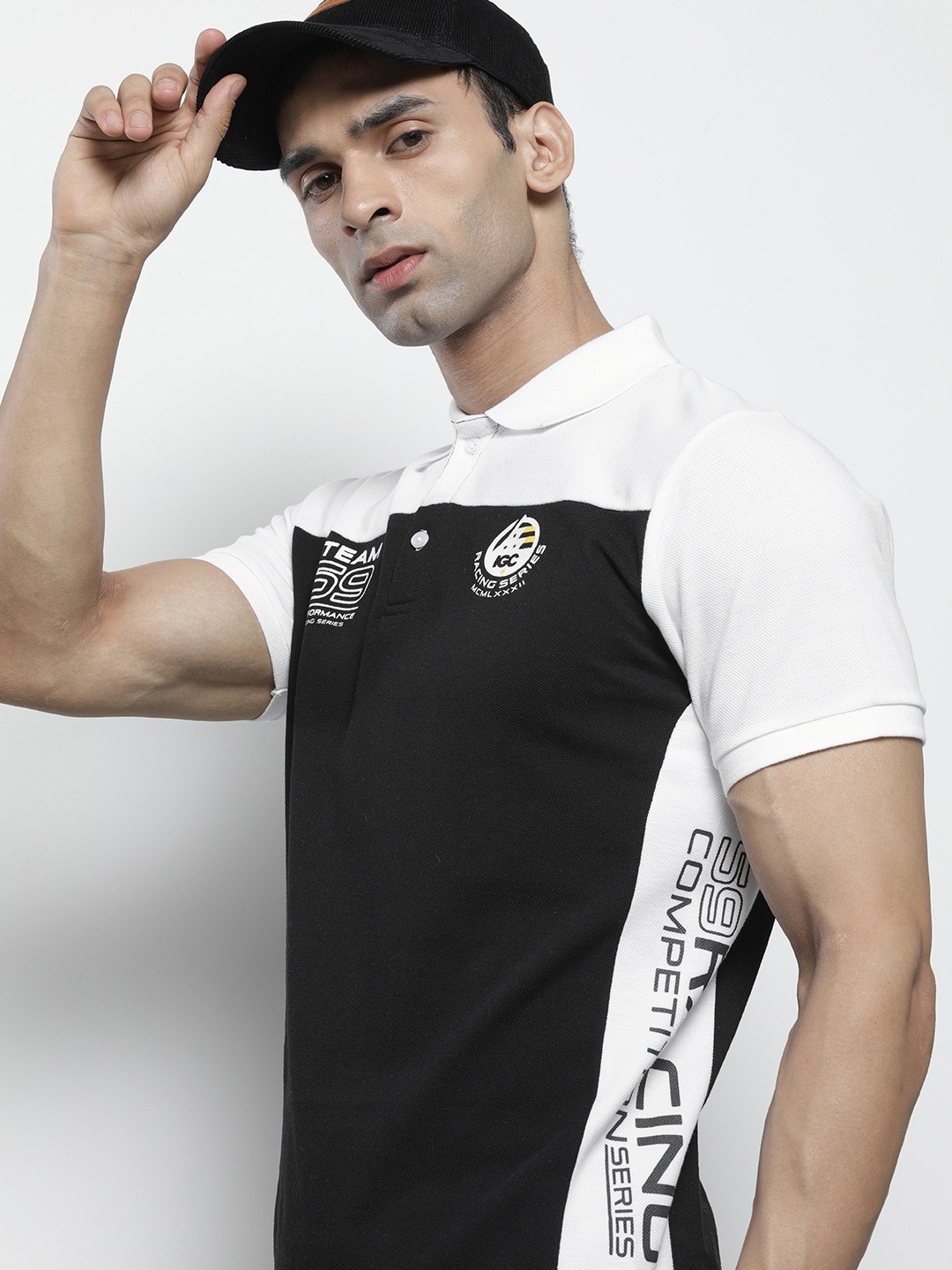 

The Indian Garage Co Men Black & White Colourblocked Polo Collar T-shirt