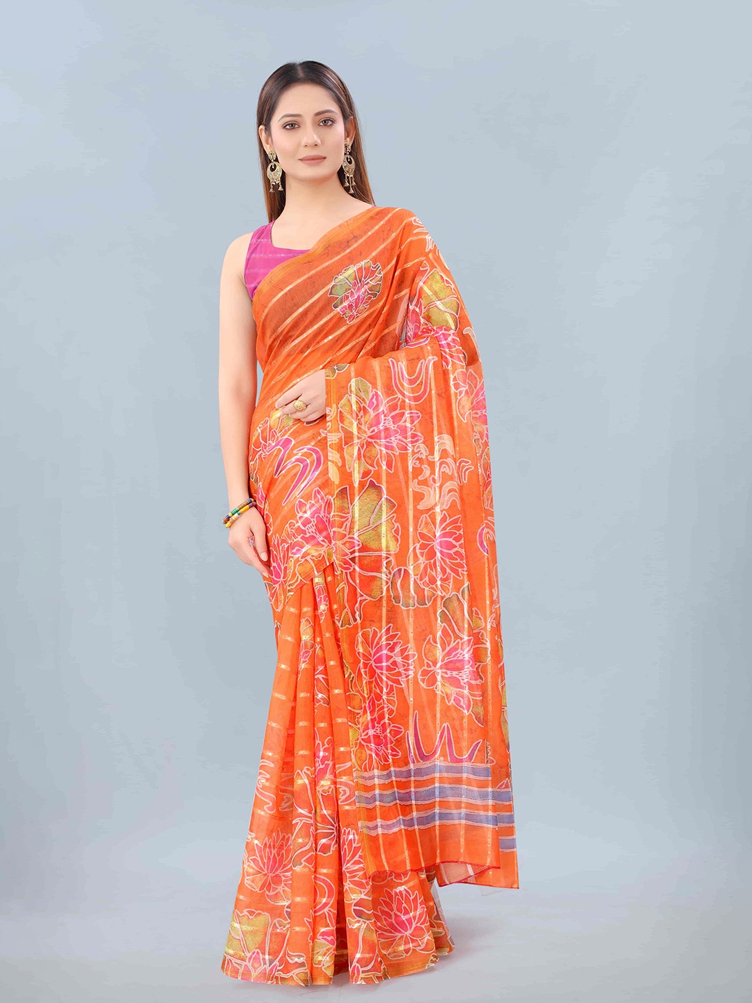 

Silk Land Orange & Yellow Floral Sequinned Silk Cotton Chanderi Saree