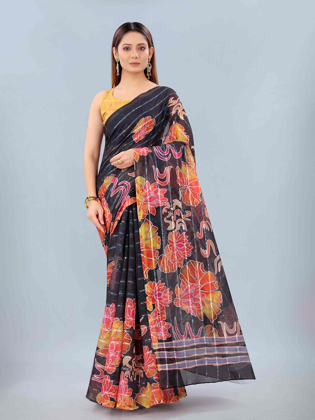 

Silk Land Black & Yellow Floral Sequinned Silk Cotton Chanderi Saree