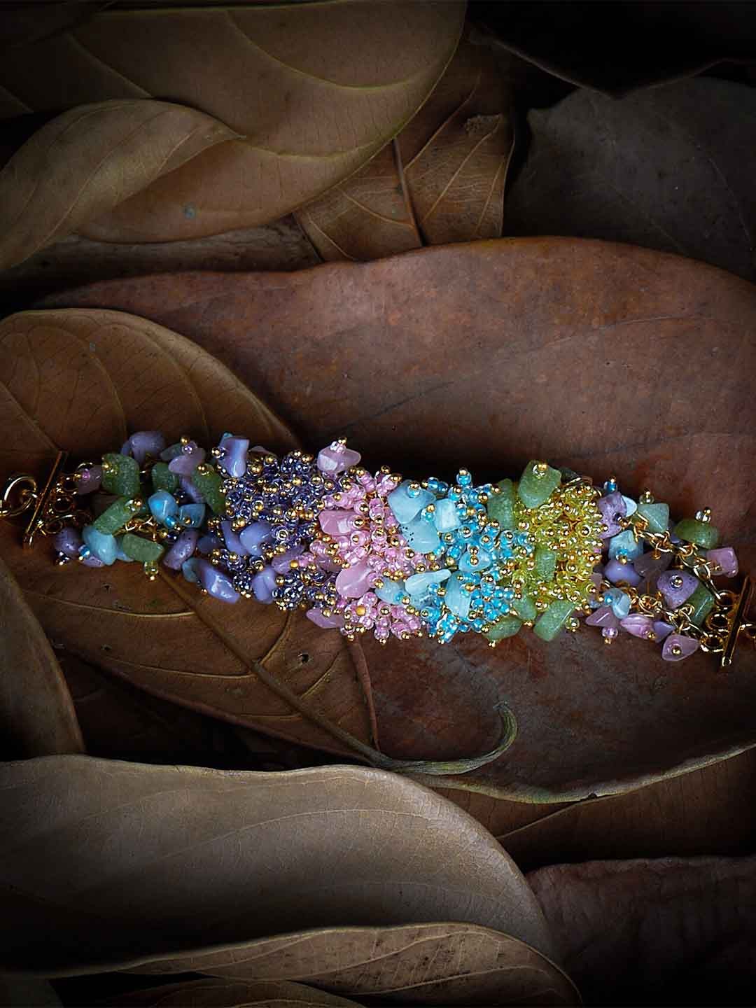 

D'oro Women Gold-Toned & Pink Handcrafted Bracelet