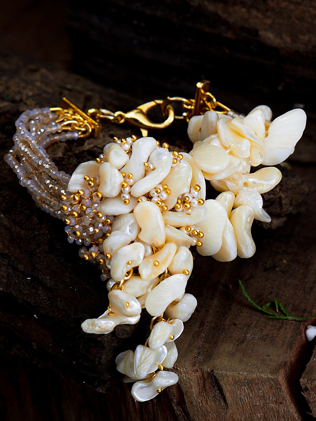 

D'oro Women Gold-Toned & White Handcrafted Bracelet