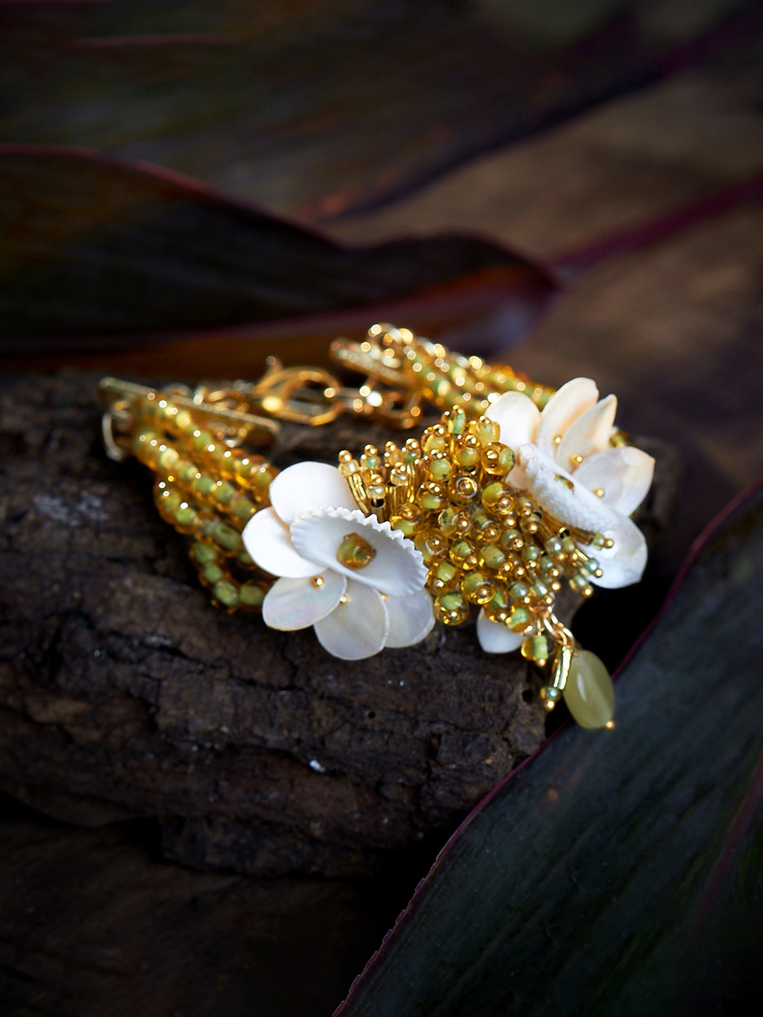 

D'oro Women Gold-Toned & Yellow Handcrafted Bracelet
