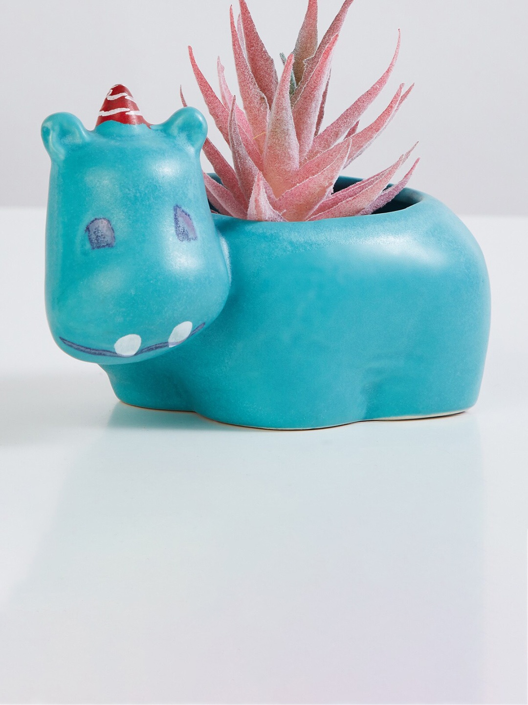 

Home Centre Blue Rhino Ceramic Planter