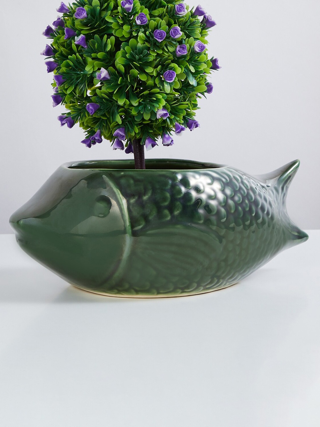 

Home Centre Green Textured Fish Ceramic Planter