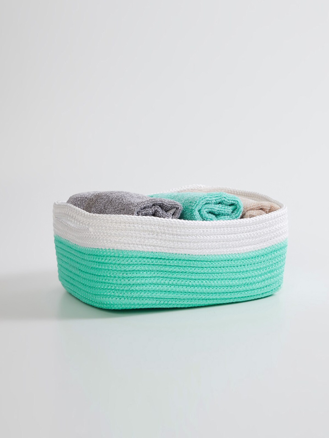 

Home Centre Green & White Textured Laundry Basket