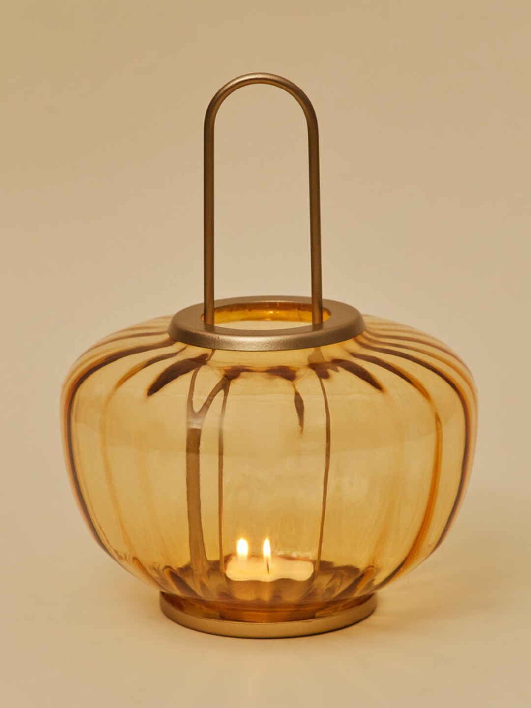 

Home Centre Gold Toned Splendid Textured Glass Hanging T-Light Holder