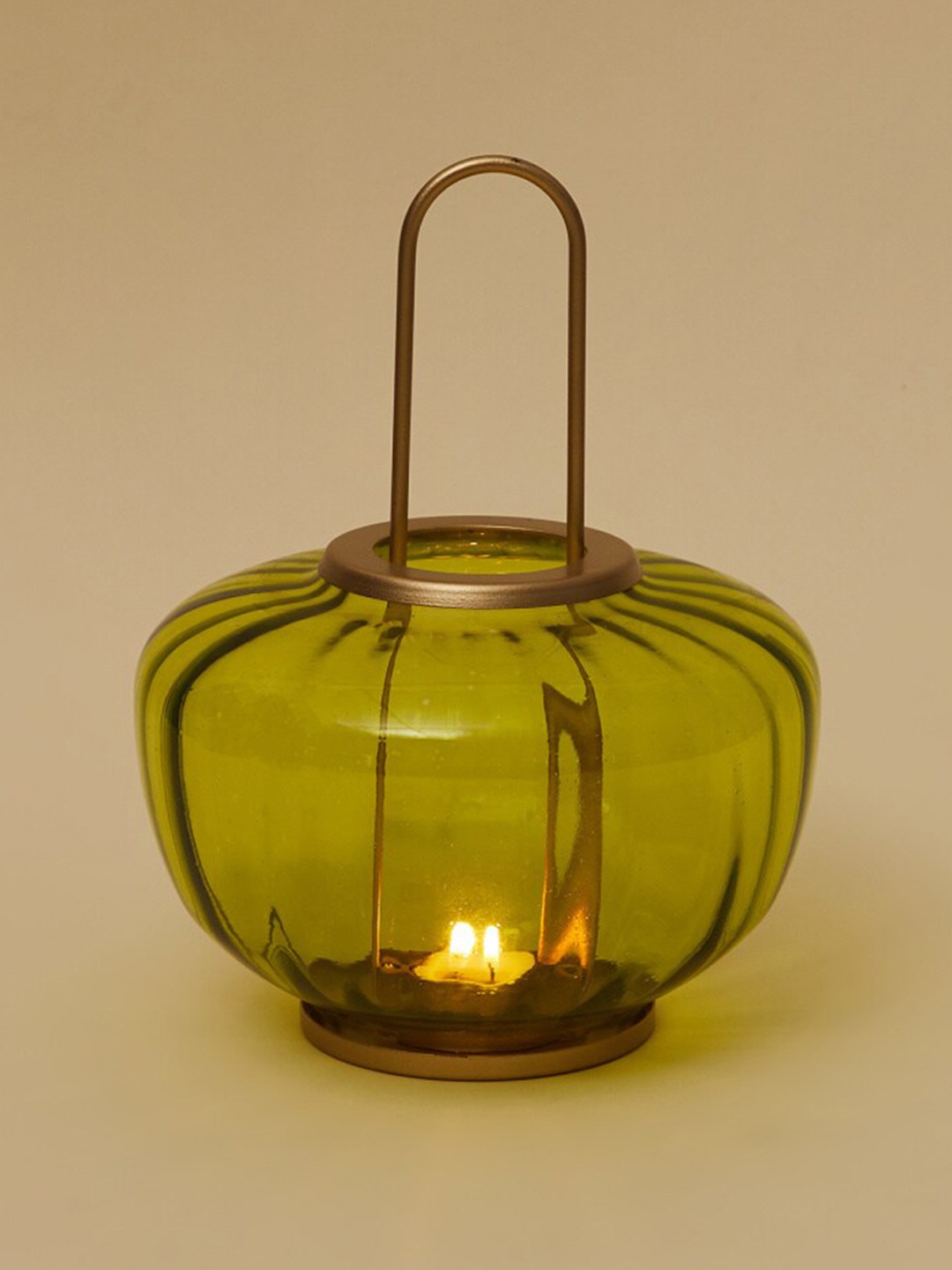 

Home Centre Green Textured Glass Hanging T-light Candle Holder