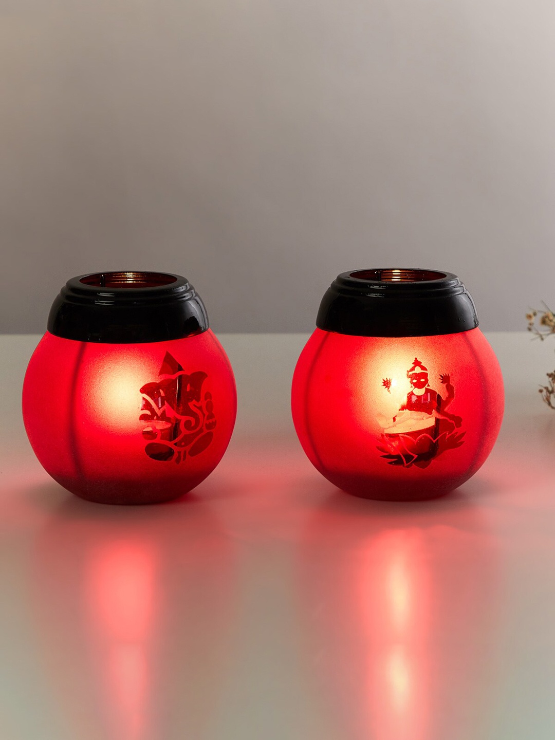 

Home Centre Set Of 2 Red Glass Tea Light Candle Holders