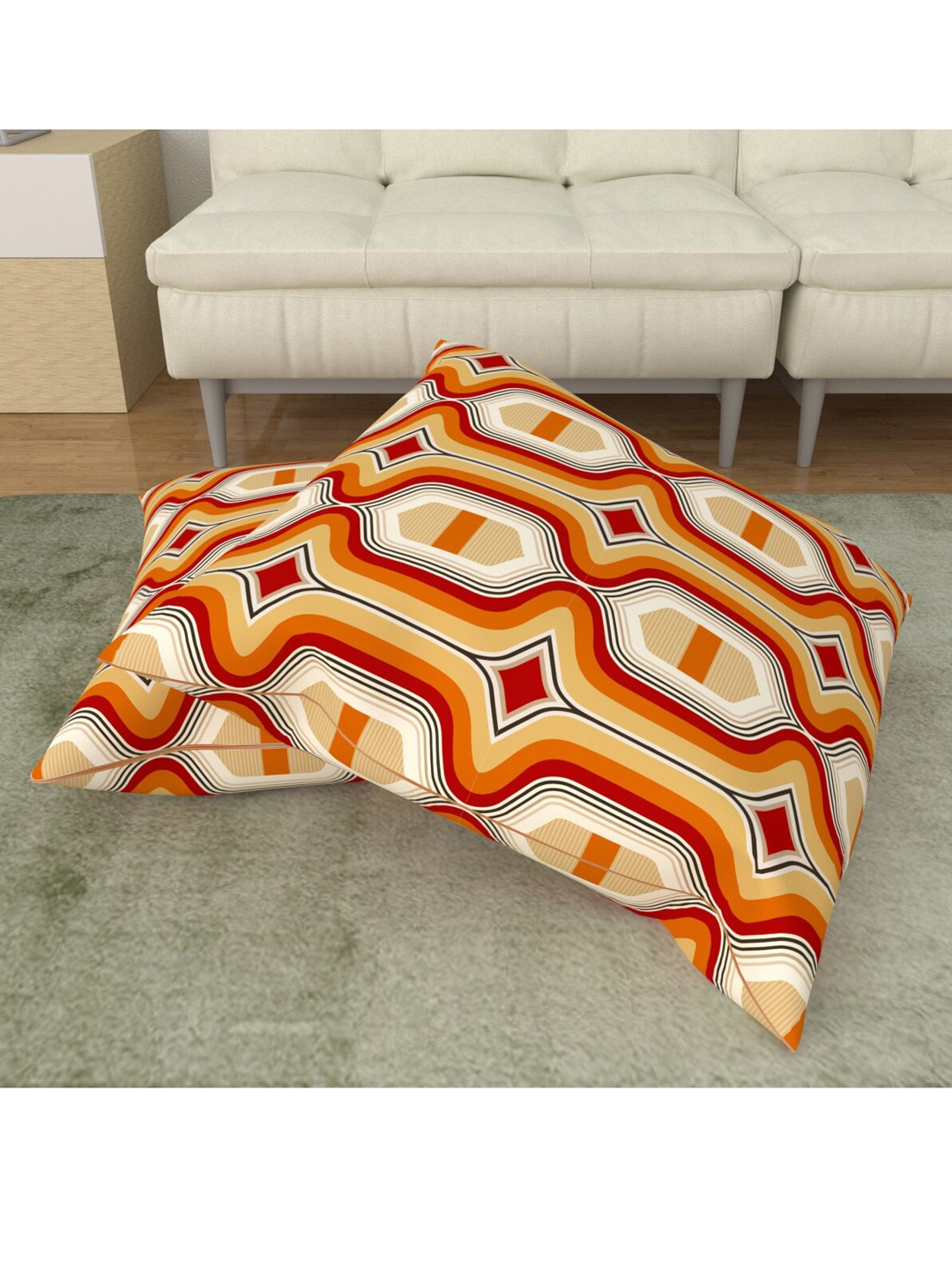 

Home Centre Set Of 2 Red and Orange Printed Cotton Floor Cushions