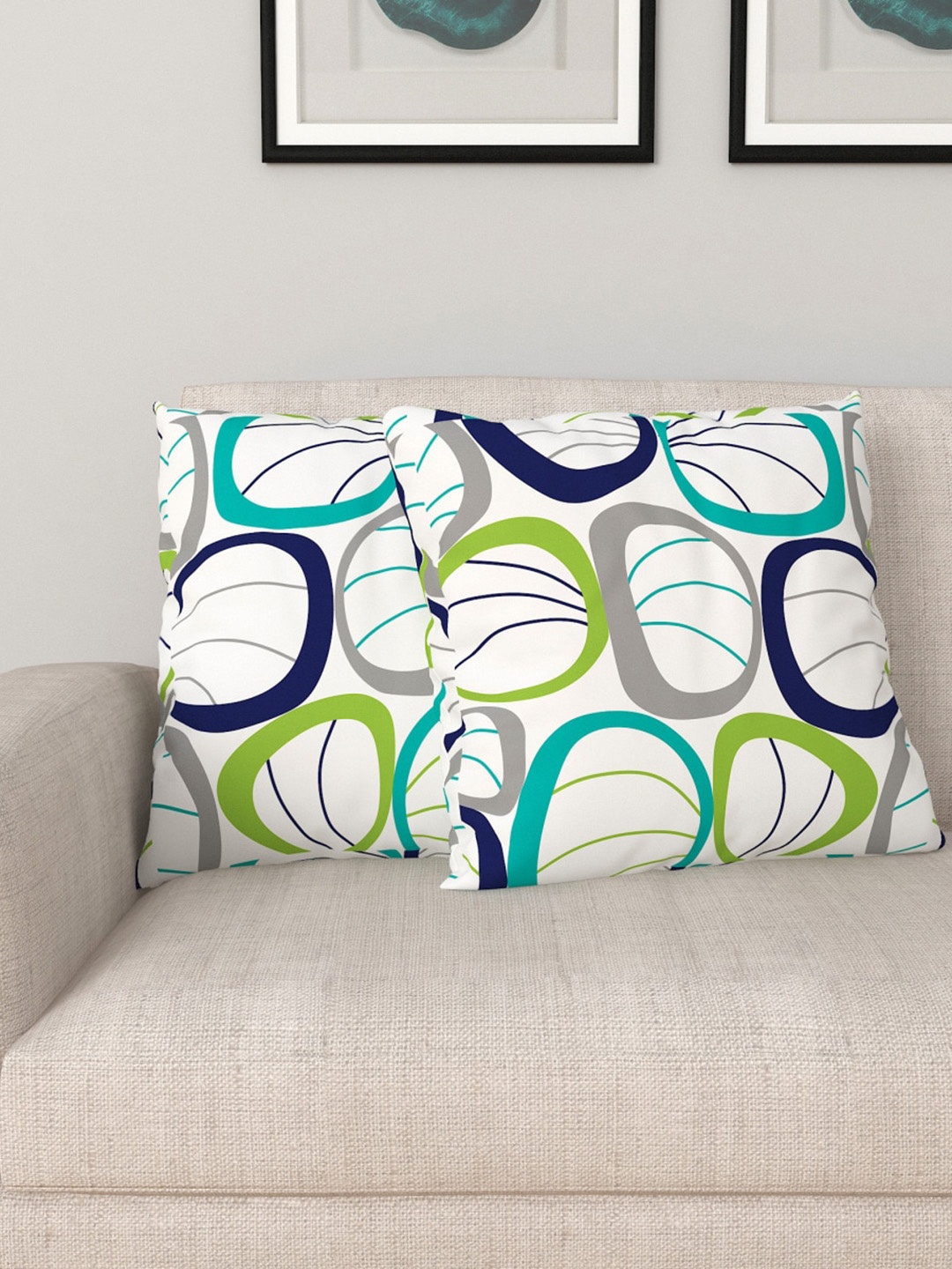 

Home Centre Set Of 2 White & Green Printed Filled Cotton Cushion