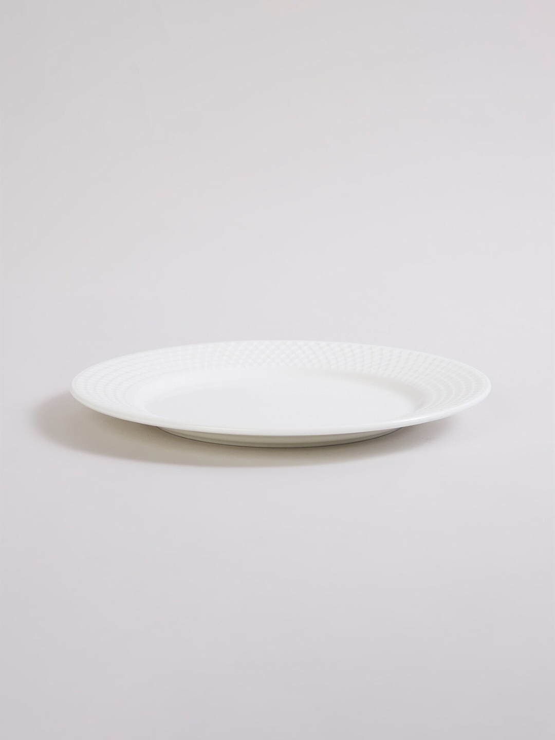 

Home Centre White 1 Piece Textured Bone China Glossy Plates
