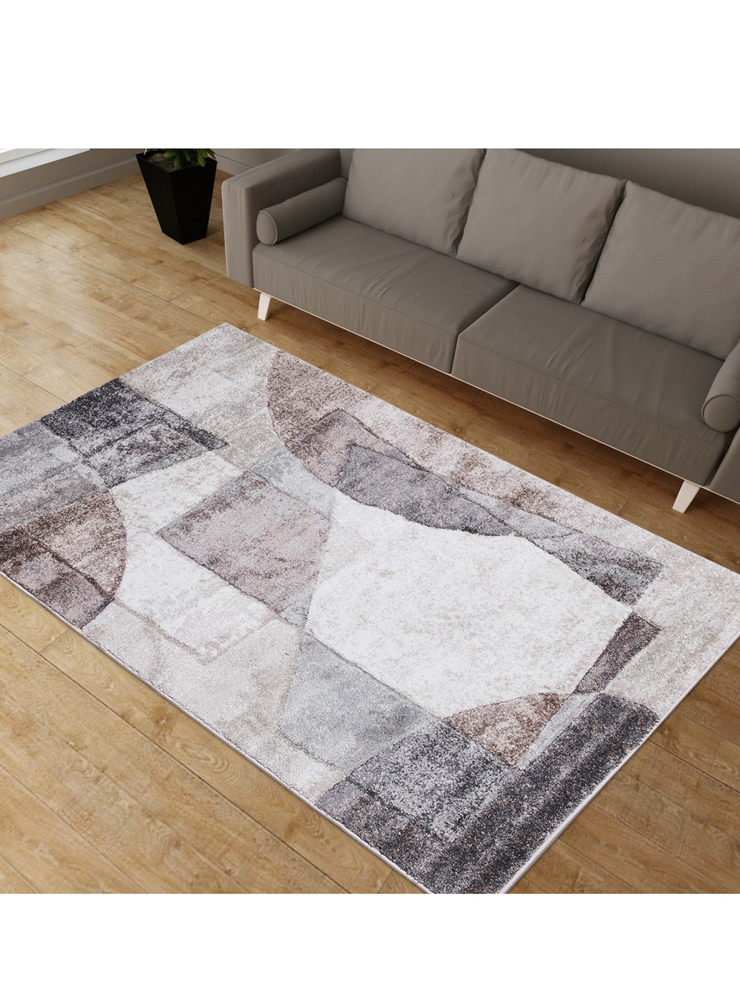 

Home Centre Brown Geometric Anti-Skid Rectangular Woven Carpet