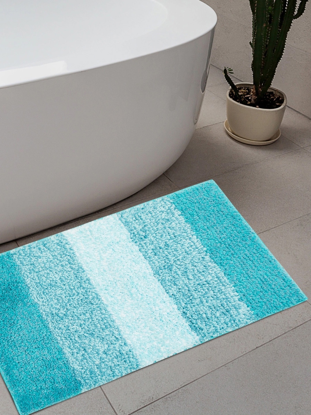 

Home Centre Blue Striped Pristine Anti-Slip Bath Rug