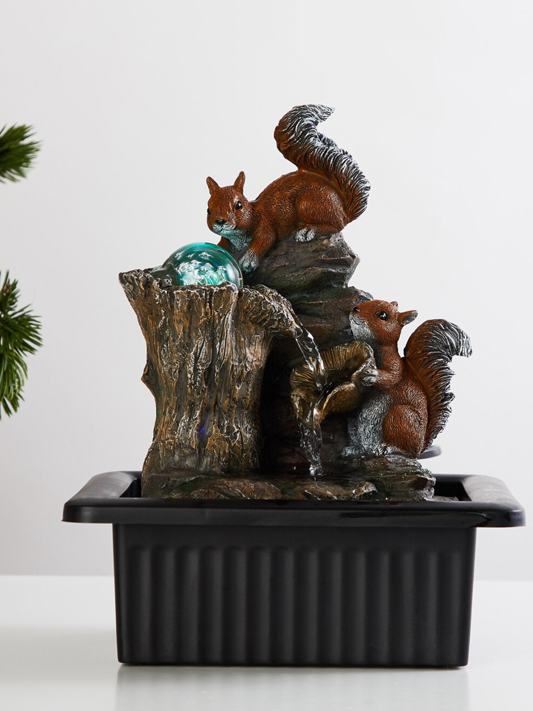 

Home Centre Black Textured Polyresin Electrical Squirrel Water Fountain