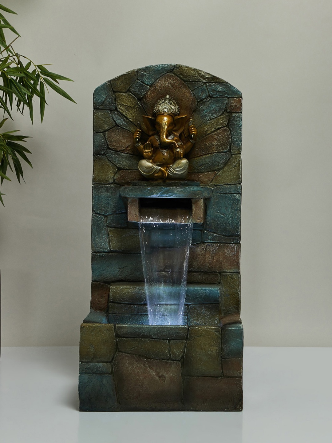 

Home Centre Grey & Beige Textured Polyresin Electrical Ganesha Water Fountain