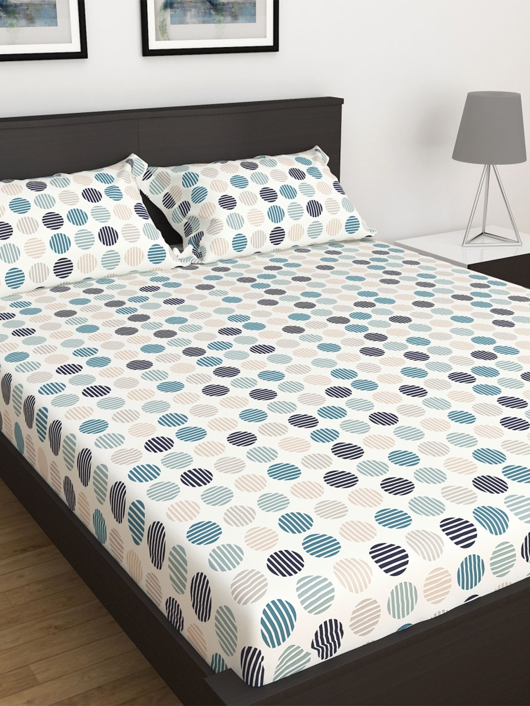 

Home Centre White & Blue Geometric 180 TC Queen Bedsheet with 2 Pillow Covers