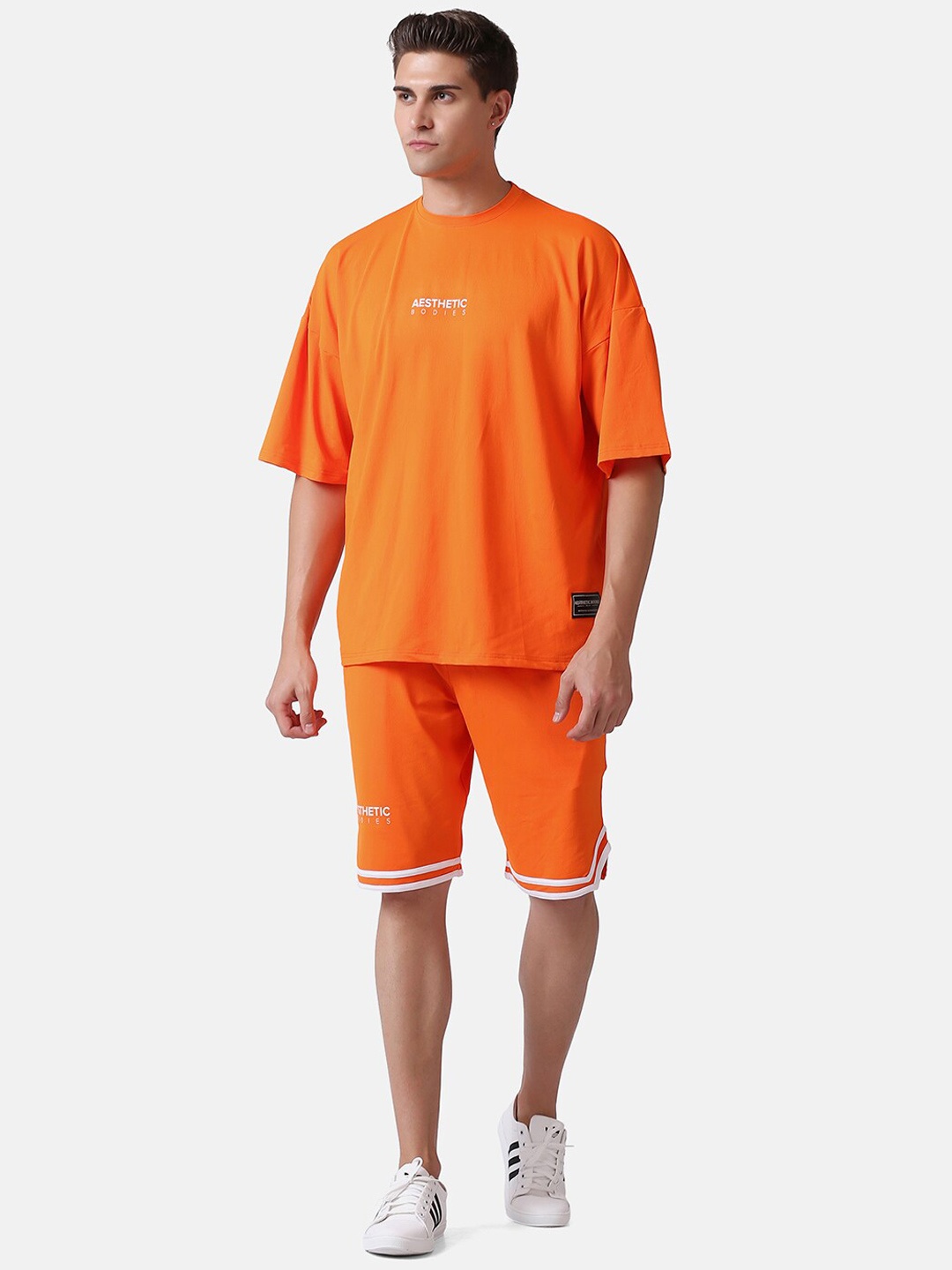 

Aesthetic Bodies Men Orange Solid Sports Co-Ord Set
