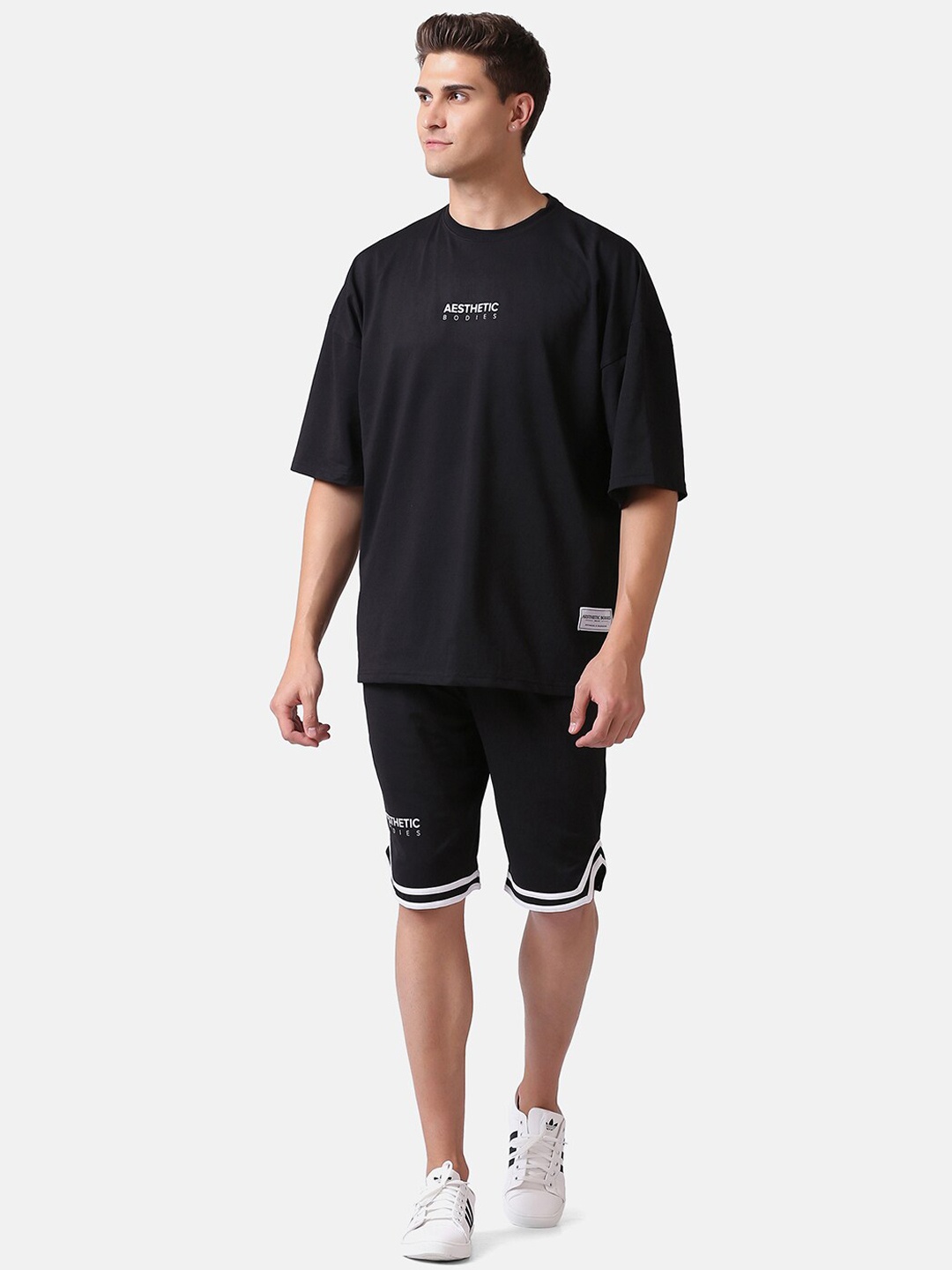 

Aesthetic Bodies Men Black Solid Sports Co-ords