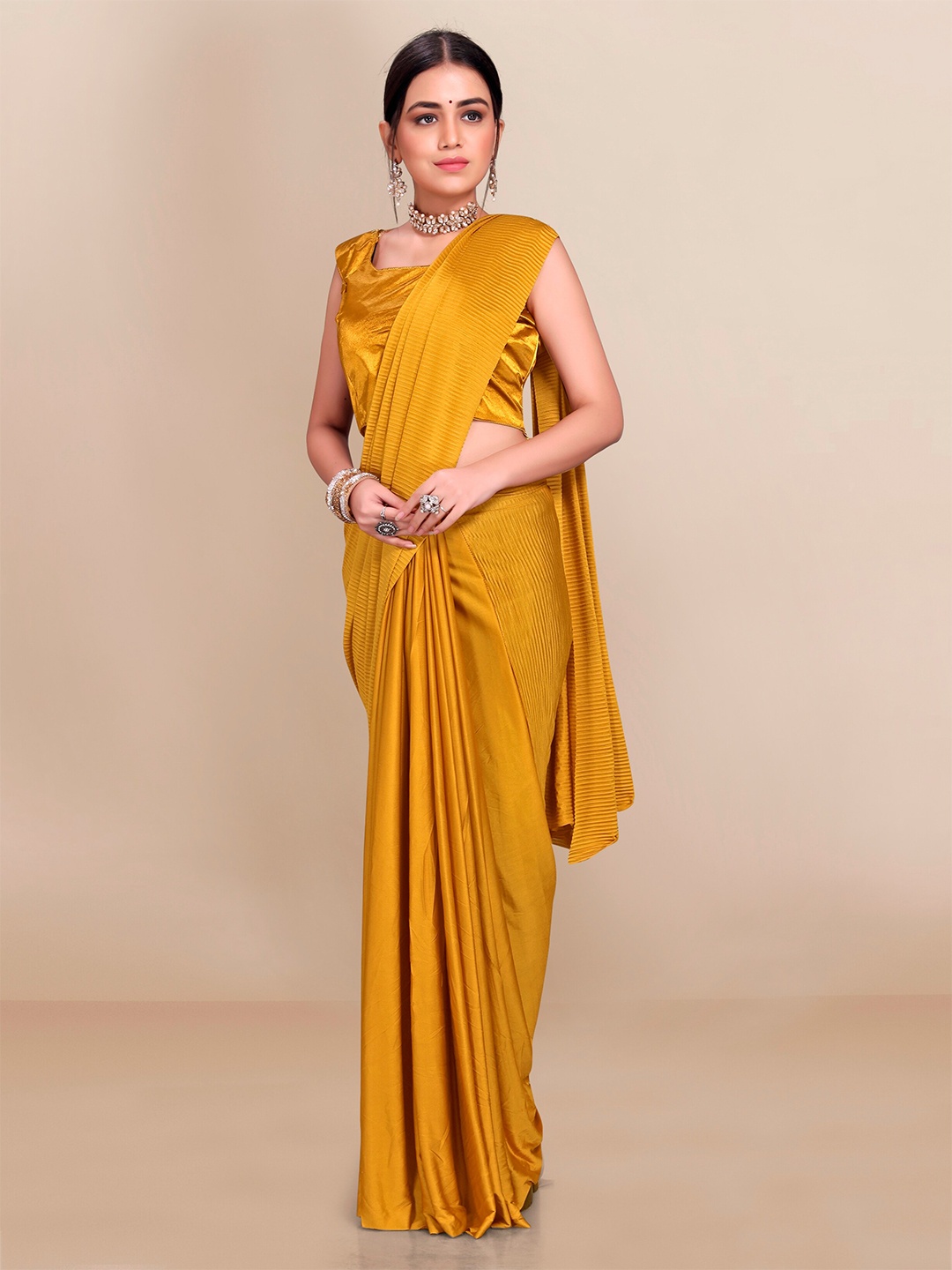 

VAIRAGEE Mustard Yellow Solid Saree