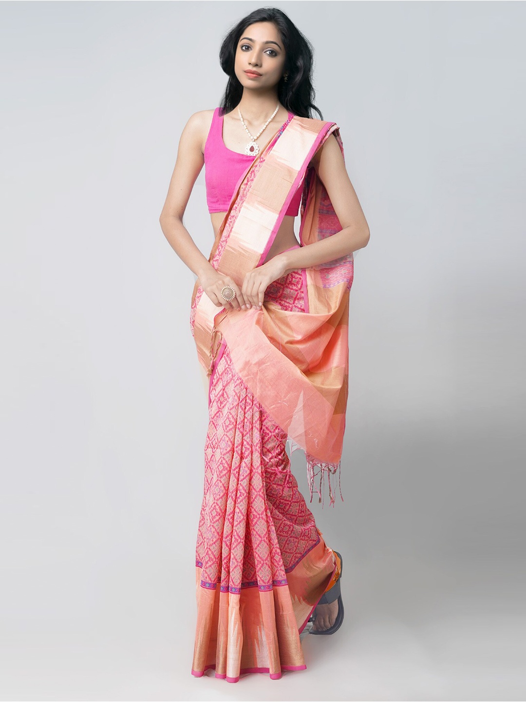 

Unnati Silks Orange & Pink Ethnic Motifs Silk Blend Saree