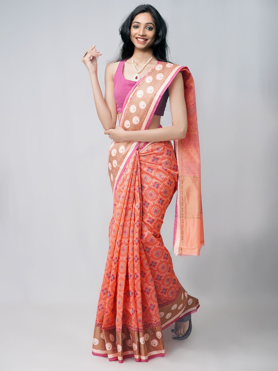 

Unnati Silks Orange & Pink Ethnic Motifs Silk Blend Saree