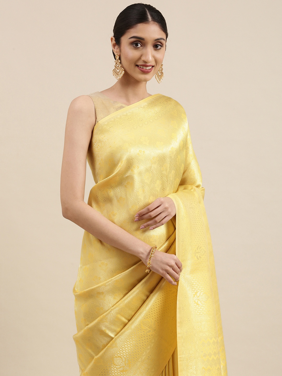 

Mitera Yellow Ethnic Motifs Zari Pure Silk Kanjeevaram Saree