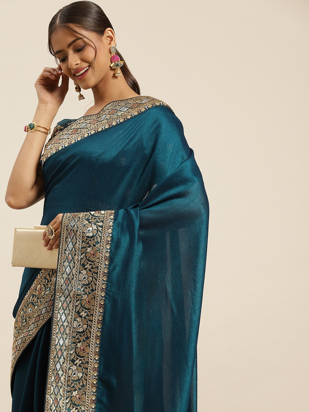 

Sangria Teal Blue & Golden Silk Blend Saree With Woven Design Border