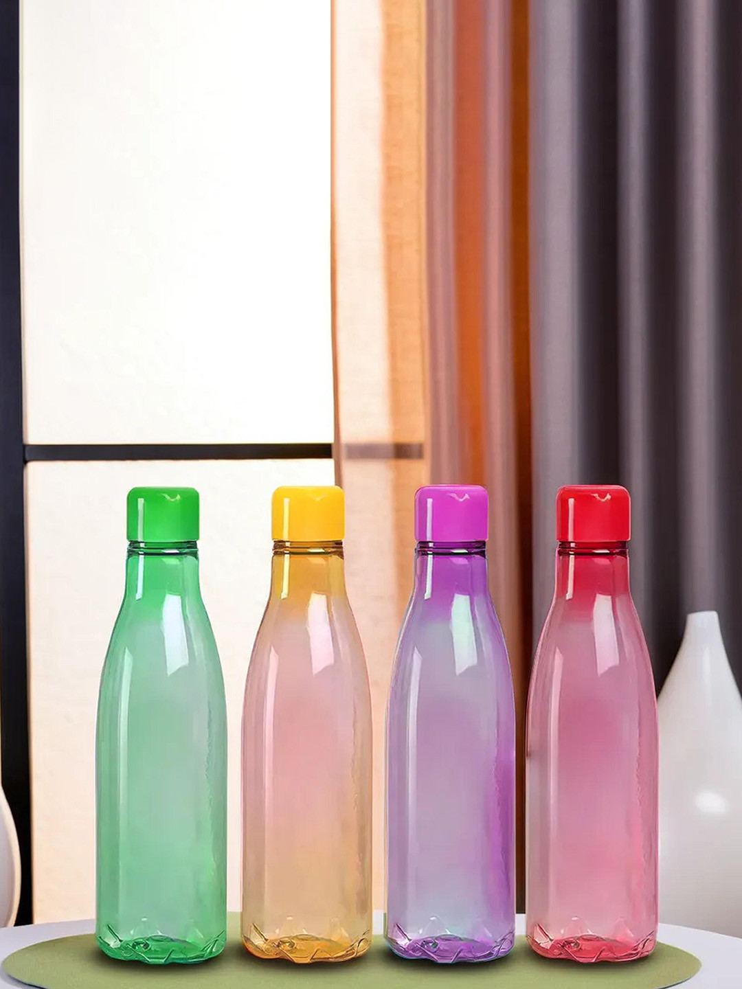 

Kuber Industries Set of 4 BPA Free Round Plain Plastic Refrigerator Bottles, Purple