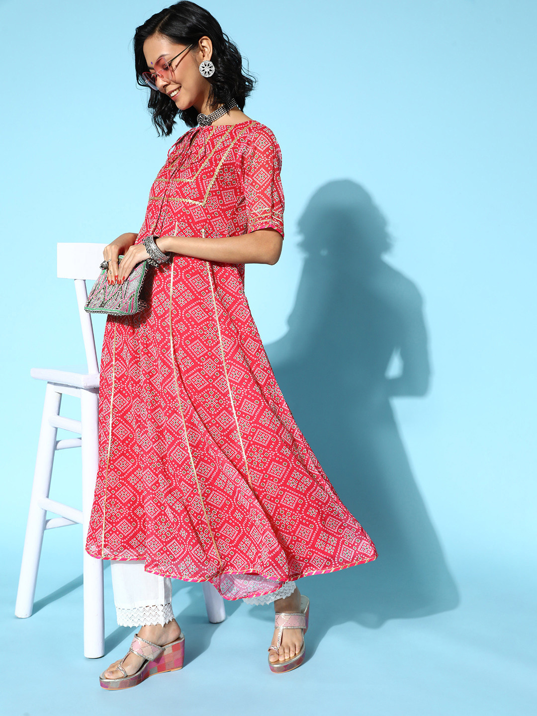

Inddus Women Attractive Rose Chiffon Swirling Volume Kurta