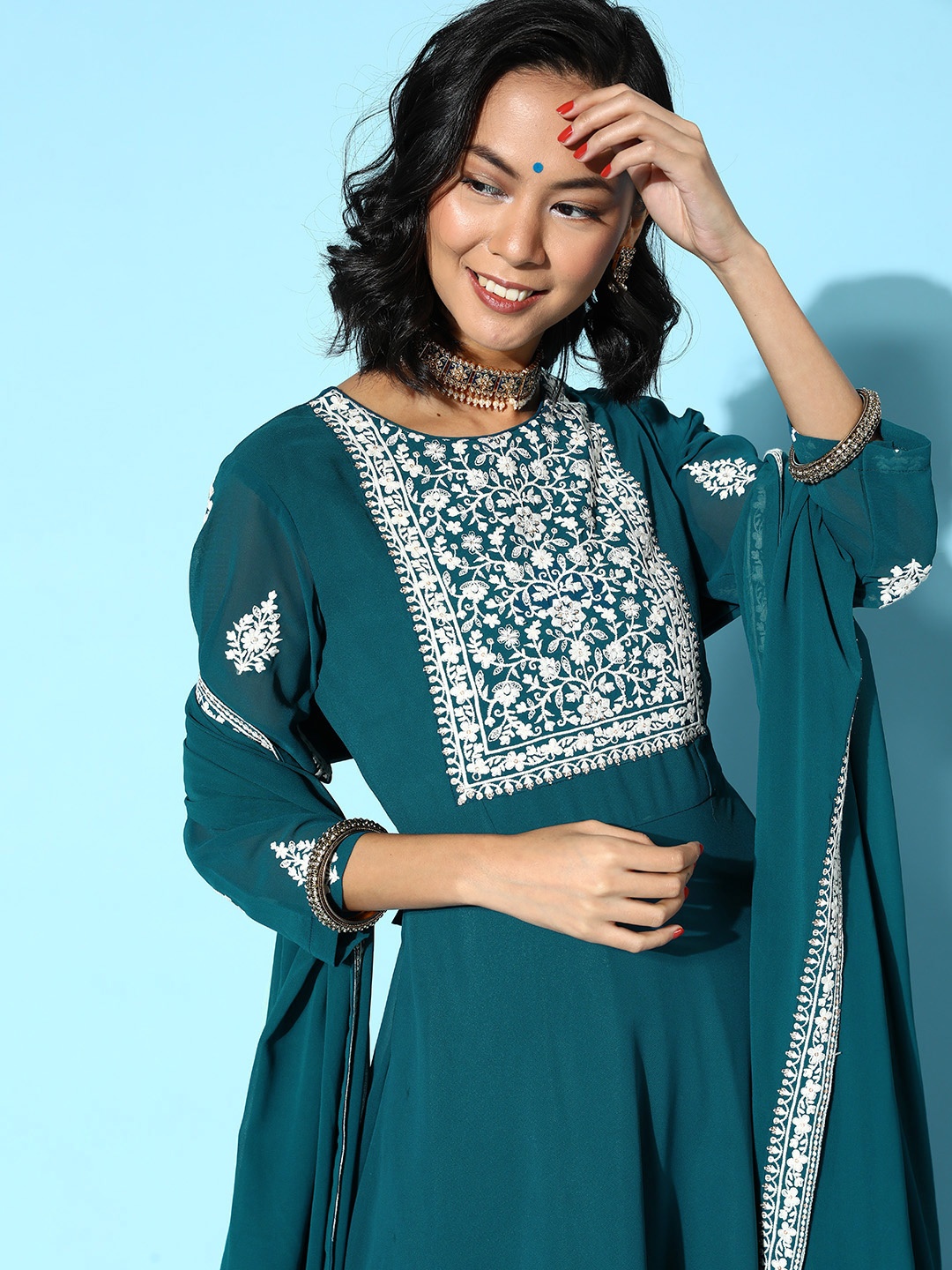 

Inddus Women Tranquil Teal Georgette Swirling Volume Kurta