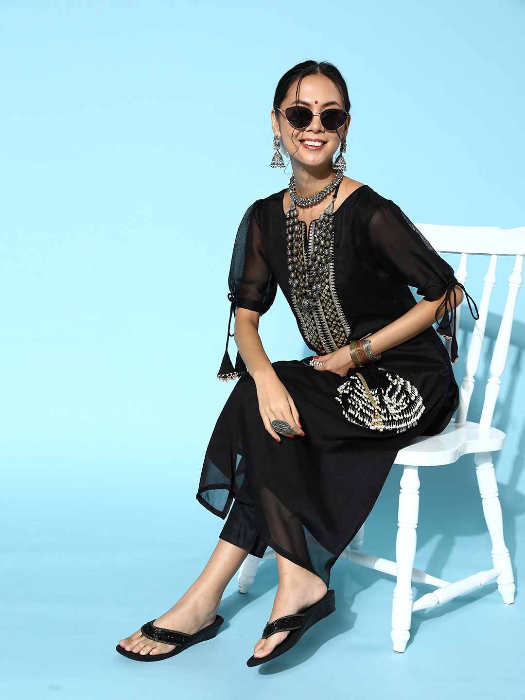 

Inddus Women Solid Silk Blend Nuovo Sleeves Kurta Set, Black