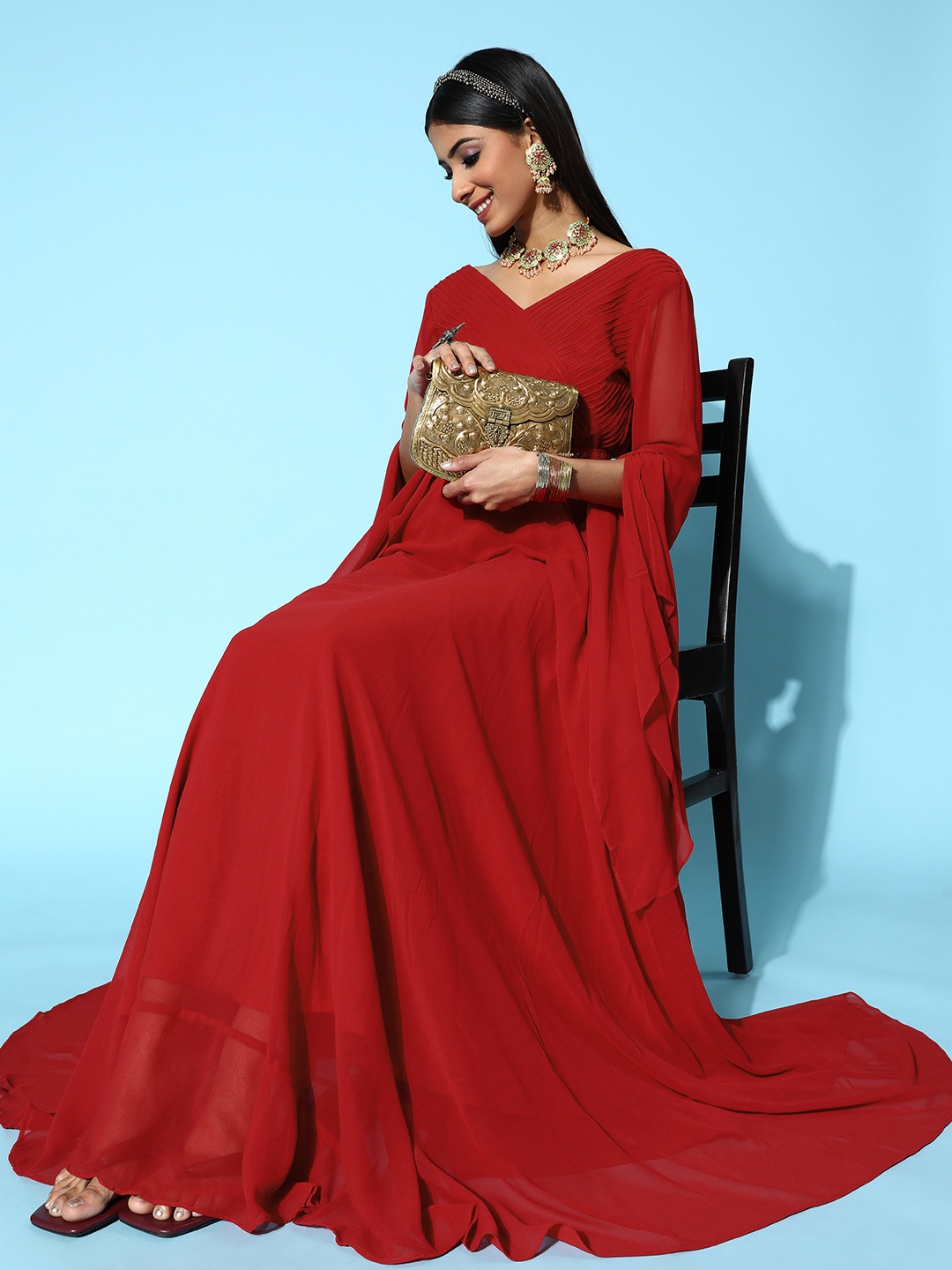 

Inddus Women Attractive Maroon Solid Swirling Volume Dress