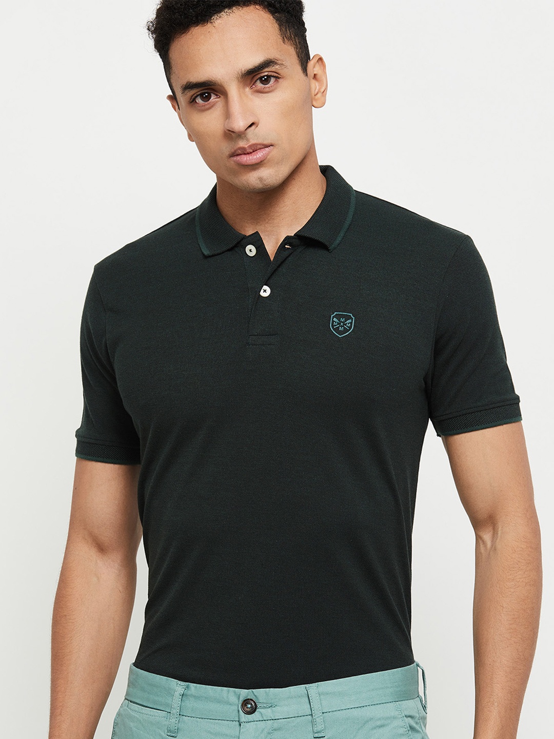 

max Men Olive Green Solid Polo Collar T-shirt