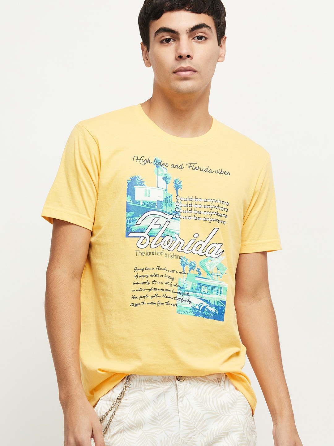 

max Men Yellow Typography Printed T-shirt